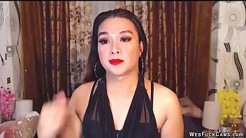 Sexy Brunette Asian Amateur Babe In Black Outfit With Full Make Up And Big Ear Rings Posing And Chatting With Her Users In Private Webcam Show thumbnail